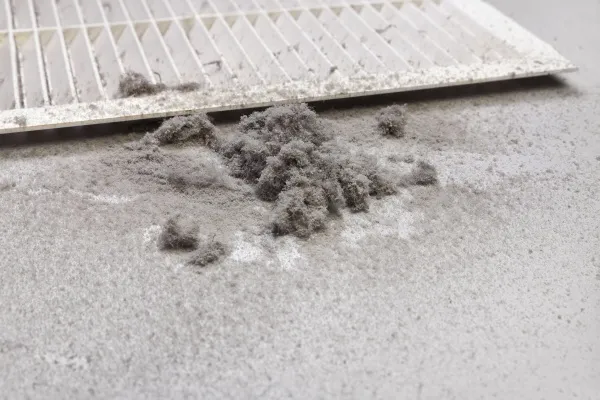 Dust and debris accumulating in an air duct during cleaning service in New Jersey Dust and debris accumulating in an air duct during cleaning service in New Jersey
