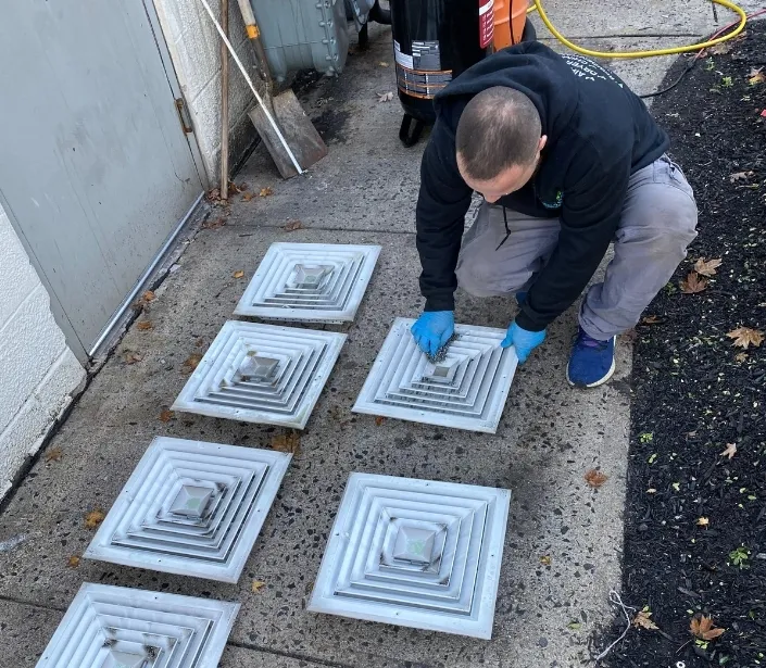 Home air duct inspection process in New Jersey demonstrating technician's attention to detail and quality service measures